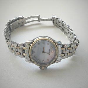 TISSOT Stainless Steel amd Saphhire Crystasl Water resistant Silver Gold watchTI